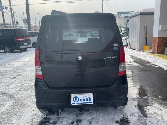 ワゴンＲ ＦＸリミテッド　４ＷＤ　スマートキー　プッシュスタート　シートヒーター　ライトレベライザー　純正ＣＤオーディオ　夏冬タイヤＡＷ付（3枚目）