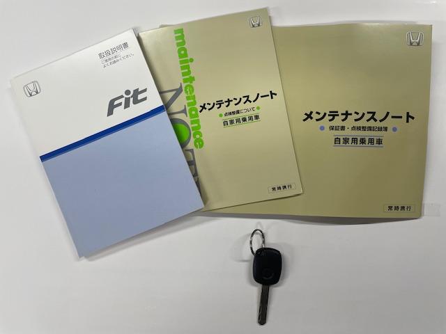 フィット コンフォートエディション　４ＷＤ　純正オーディオ　キーレス　電動格納ミラー　オートエアコン　チルトステアリング（42枚目）