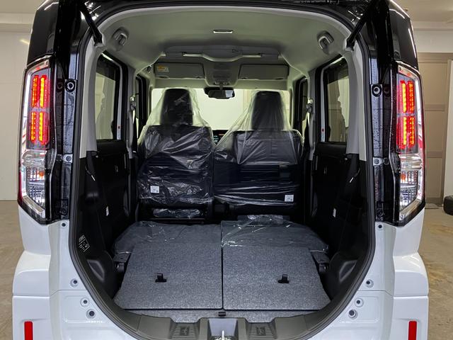 スペーシアカスタム ハイブリッドＸＳ　４ＷＤ　届出済未使用車　スズキセーフティー　スズキコネクト　全方位カメラ　９型ナビ　フルセグ　１５インチ純正ＡＷ　ＡｐｐｌｅＣａｒＰｌａｙ　ステアリングヒーター　電動パーキング　マルチユースフラップ（52枚目）