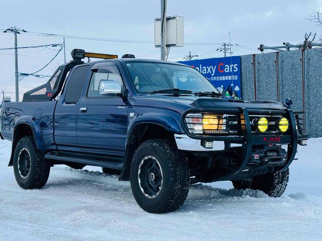 ハイラックススポーツピック エクストラキャブ　ワイド　４ＷＤオーバーフェンダー　サイドステップ　ＴＲＤマッドガードＰＲＯ　ＣＯＭＰ　ＸＴＲＥＭＥ１６インチＡＷ　ＨＡＭＥＲ　ＶＩＣＴＯＲ　ＳＥＲＩＥＳ　ロールバーＪＡＯＳグリルガード　ウインチ　リフトアップ（12枚目）