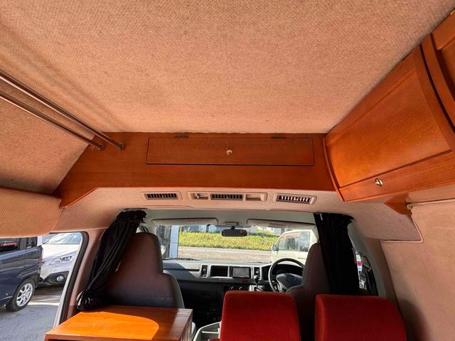 ハイエースワゴン 　４ＷＤ　キャンピングカー　ＥＴＣ　バックカメラ　ナビ　ＴＶ　スライドドア　アルミホイール　ＡＴ　エアコン　パワーウィンドウ　ベバストＦＦヒーター　サブバッテリー　電子レンジ　コンロ　シンク　テーブル（28枚目）