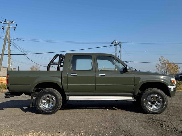 ハイラックスピックアップ ダブルキャブ SR 4WD MTヒッチメンバー エアコン カセット タイミングベルト交換済み(7枚目)