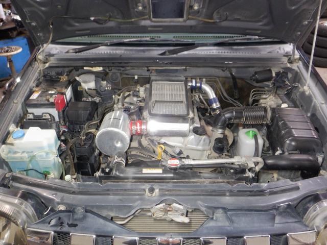 ジムニー クロスアドベンチャーＸＣ　４ＷＤ　本州仕入　修復歴なし　ナビ　ＴＶ　Ｂ／Ｔ　ＥＴＣ　キーレス　シートヒーター　ミラーヒーター　ライトレベライザー　フォグランプ　電動格納ミラー　ドアバイザー　社外ＡＷ　ターボ（27枚目）