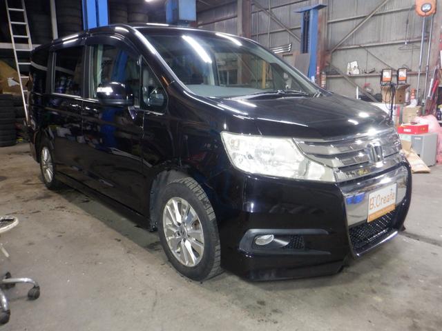 ステップワゴンスパーダ Ｚ　４ＷＤ　ナビ　ＴＶ　Ｂ／Ｔ　Ｂカメラ　両側電動　スマートキー　ＨＩＤ　ＥＴＣ　ワイパーデアイサー　ミラーヒーター　ＶＳＡ　リアヒーター　フォグランプ　オートエアコン（9枚目）