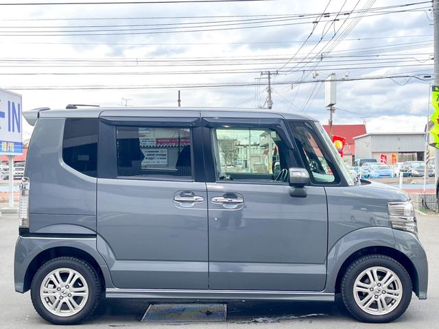 Ｎ－ＢＯＸカスタム Ｇ・Ｌパッケージ　４ＷＤ　純正ナビ　地デジＴＶ　ＤＶＤ　バックカメラ　両側電動スライド　オートＨＩＤライト　フォグライト　横滑り防止　純正アルミホイール　スマートキー　ベンチシート　純正エアロ　ステアリングスイッチ（8枚目）