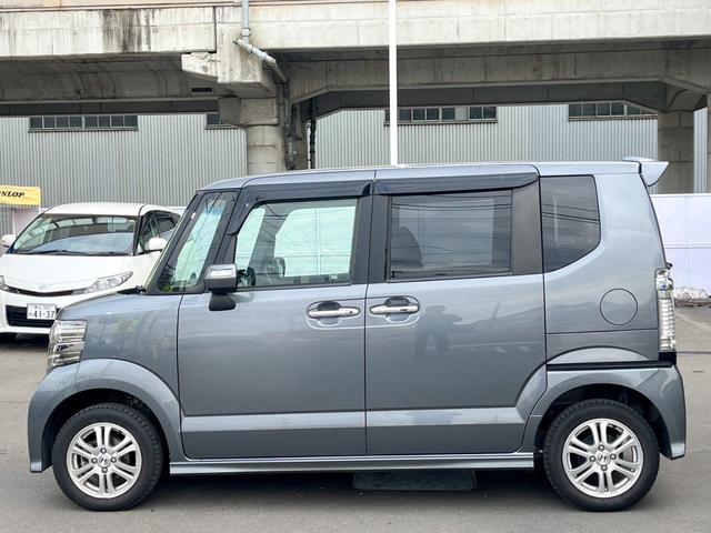 Ｎ－ＢＯＸカスタム Ｇ・Ｌパッケージ　４ＷＤ　純正ナビ　地デジＴＶ　ＤＶＤ　バックカメラ　両側電動スライド　オートＨＩＤライト　フォグライト　横滑り防止　純正アルミホイール　スマートキー　ベンチシート　純正エアロ　ステアリングスイッチ（12枚目）