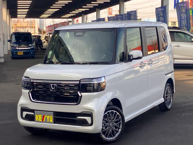 Ｎ－ＢＯＸカスタム ターボ　４ＷＤ　届出済未使用　ターボ　純正８型ナビ　地デジＴＶ　Ｂｌｕｅｔｏｏｔｈ　バックカメラ　両側電動スライドドア　追従クルーズコントロール　シートヒーター　ハーフ革シート　スマートキー　ホンダセンシング（5枚目）
