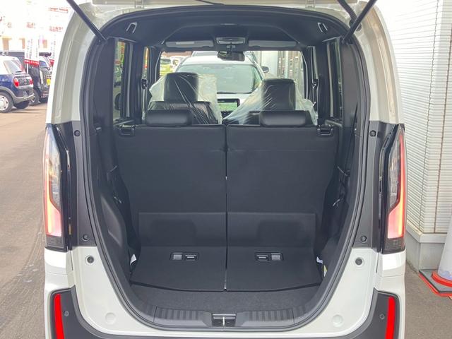 Ｎ－ＢＯＸカスタム ターボ　４ＷＤ　届出済未使用　ターボ　純正８型ナビ　地デジＴＶ　Ｂｌｕｅｔｏｏｔｈ　バックカメラ　両側電動スライドドア　追従クルーズコントロール　シートヒーター　ハーフ革シート　スマートキー　ホンダセンシング（22枚目）