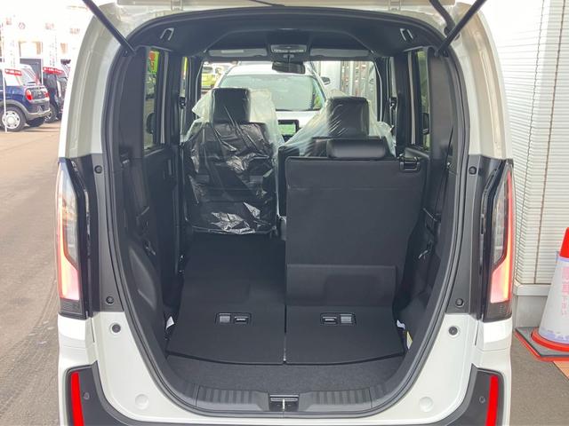 Ｎ－ＢＯＸカスタム ターボ　４ＷＤ　届出済未使用　ターボ　純正８型ナビ　地デジＴＶ　Ｂｌｕｅｔｏｏｔｈ　バックカメラ　両側電動スライドドア　追従クルーズコントロール　シートヒーター　ハーフ革シート　スマートキー　ホンダセンシング（23枚目）