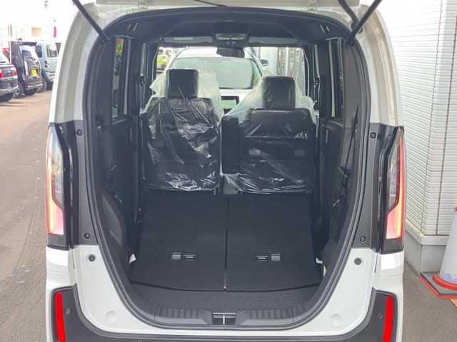 Ｎ－ＢＯＸカスタム ターボ　４ＷＤ　届出済未使用　ターボ　純正８型ナビ　地デジＴＶ　Ｂｌｕｅｔｏｏｔｈ　バックカメラ　両側電動スライドドア　追従クルーズコントロール　シートヒーター　ハーフ革シート　スマートキー　ホンダセンシング（24枚目）