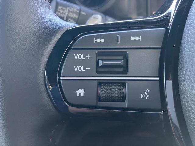 Ｎ－ＢＯＸカスタム ターボ　４ＷＤ　届出済未使用　ターボ　純正８型ナビ　地デジＴＶ　Ｂｌｕｅｔｏｏｔｈ　バックカメラ　両側電動スライドドア　追従クルーズコントロール　シートヒーター　ハーフ革シート　スマートキー　ホンダセンシング（27枚目）