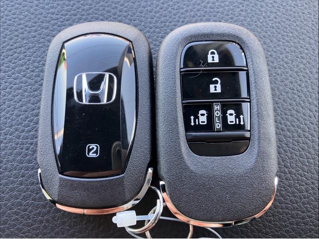 Ｎ－ＢＯＸカスタム ターボ　４ＷＤ　届出済未使用　ターボ　純正８型ナビ　地デジＴＶ　Ｂｌｕｅｔｏｏｔｈ　バックカメラ　両側電動スライドドア　追従クルーズコントロール　シートヒーター　ハーフ革シート　スマートキー　ホンダセンシング（39枚目）