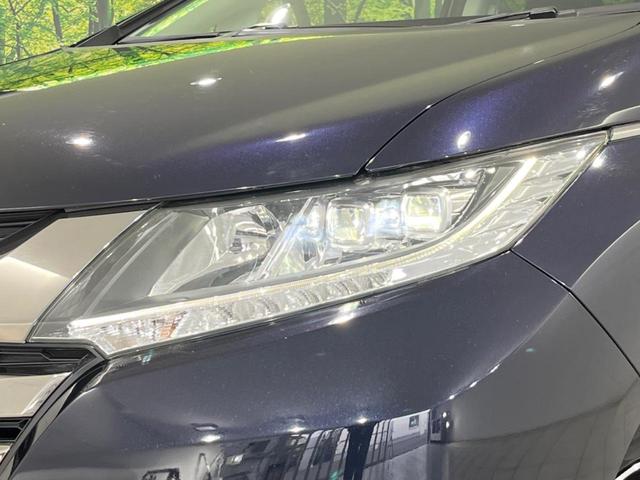 オデッセイ アブソルート・Ｘホンダセンシングアドバンスドパッケジ　両側電動スライドドア　ホンダセンシング　禁煙車　純正ナビ　全周囲カメラ　アダプティブクルーズ　寒冷地仕様　バックカメラ　ＥＴＣ　Ｂｌｕｅｔｏｏｔｈ　フルセグ　リアオートエアコン　スマートキー（14枚目）