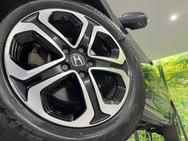 ヴェゼル ハイブリッドZ・ホンダセンシング 純正SDナビ バックカメラ 寒冷地仕様 ホンダセンシング アダプティブレーダークルーズ 禁煙車 コーナーセンサー スマートキー LEDヘッド ビルトインETC オートハイビーム 車線逸脱警報(14枚目)