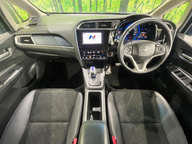 シャトル ハイブリッドXスタイルエディション SDナビ バックカメラ 寒冷地仕様 シティブレーキアクティブシステム 禁煙車 ハーフレザーシート スマートキー LEDヘッド ビルトインETC クルコン オートライト オートエアコン 横滑り防止装置(2枚目)