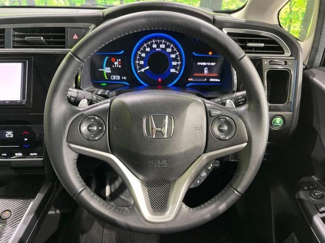 シャトル ハイブリッドXスタイルエディション SDナビ バックカメラ 寒冷地仕様 シティブレーキアクティブシステム 禁煙車 ハーフレザーシート スマートキー LEDヘッド ビルトインETC クルコン オートライト オートエアコン 横滑り防止装置(12枚目)