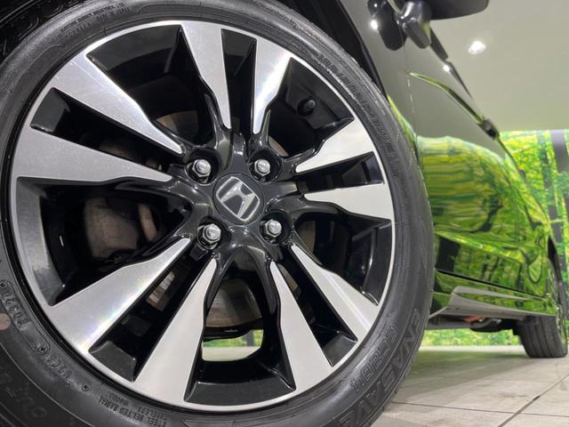 シャトル ハイブリッドXスタイルエディション SDナビ バックカメラ 寒冷地仕様 シティブレーキアクティブシステム 禁煙車 ハーフレザーシート スマートキー LEDヘッド ビルトインETC クルコン オートライト オートエアコン 横滑り防止装置(14枚目)