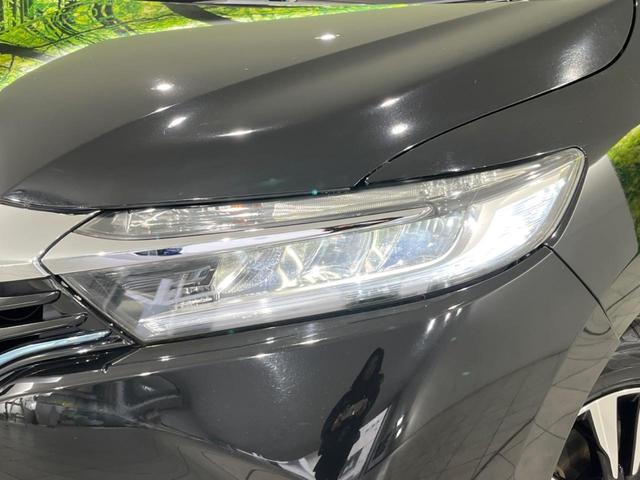 シャトル ハイブリッドXスタイルエディション SDナビ バックカメラ 寒冷地仕様 シティブレーキアクティブシステム 禁煙車 ハーフレザーシート スマートキー LEDヘッド ビルトインETC クルコン オートライト オートエアコン 横滑り防止装置(62枚目)