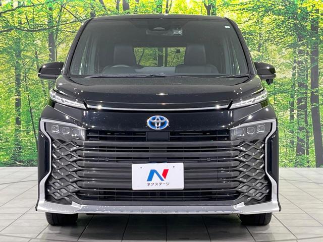 ヴォクシー ハイブリッドＳ－Ｚ　本州仕入　快適利便ＰＫＧ　１０．５インチ純正ＤＡ　両側電動ドア　後席モニター　バックカメラ　寒冷地仕様　電動リアゲート　１００Ｖ電源　レーダークルーズ　禁煙車　シートヒーター（16枚目）