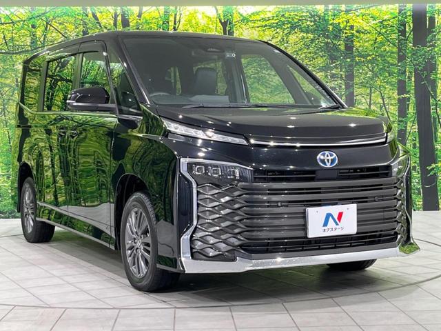 ヴォクシー ハイブリッドＳ－Ｚ　本州仕入　快適利便ＰＫＧ　１０．５インチ純正ＤＡ　両側電動ドア　後席モニター　バックカメラ　寒冷地仕様　電動リアゲート　１００Ｖ電源　レーダークルーズ　禁煙車　シートヒーター（18枚目）