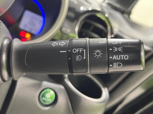 N-BOXカスタム G・ターボLパッケージ ターボ 両側電動ドア 純正SDナビ フロント・バックカメラ 衝突被害軽減システム 禁煙車 ハーフレザーシート スマートキー HIDヘッド ETC クルコン 純正15インチアルミ オートライト(35枚目)