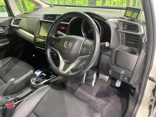 フィットハイブリッド Lパッケージ SDナビ バックカメラ 寒冷地仕様 衝突被害軽減システム 禁煙車 ハーフレザーシート ドラレコ スマートキー LEDヘッド ETC クルコン オートライト オートエアコン Bluetooth(34枚目)