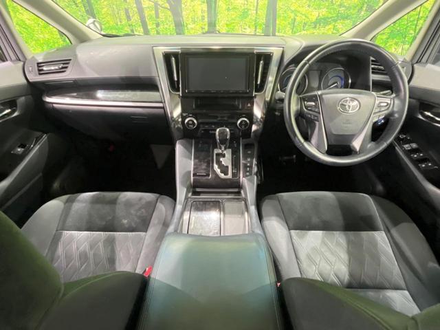 ヴェルファイアハイブリッド Ｚ　フリップダウン　両側電動スライドドア　セーフティセンス　禁煙車　純正ナビ　レーダークルーズ　寒冷地仕様　バックカメラ　ＥＴＣ　Ｂｌｕｅｔｏｏｔｈ　フルセグ　スマートキー　ＬＥＤヘッドライト（2枚目）