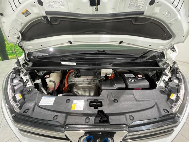 ヴェルファイアハイブリッド Ｚ　フリップダウン　両側電動スライドドア　セーフティセンス　禁煙車　純正ナビ　レーダークルーズ　寒冷地仕様　バックカメラ　ＥＴＣ　Ｂｌｕｅｔｏｏｔｈ　フルセグ　スマートキー　ＬＥＤヘッドライト（19枚目）