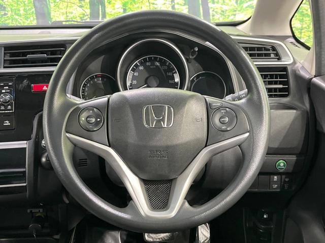 フィット 13G・Lパッケージ ファインエディション あんしんパッケージ 禁煙 寒冷地仕様 バックカメラ Bluetooth スマートキー オートライト クルーズコントロール ステアリングスイッチ オートエアコン フォグライト 盗難防止装置(11枚目)