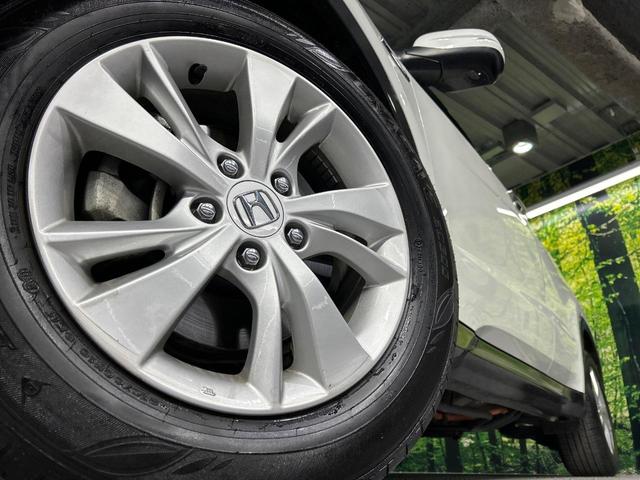 ヴェゼル ハイブリッドX・ホンダセンシング 本州仕入 4WD 純正SDナビ バックカメラ 寒冷地仕様 ホンダセンシング レーダークルーズ LEDヘッド オートライト シートヒーター デュアルオートエアコン ETC 車線逸脱警報 電動格納ミラー(15枚目)