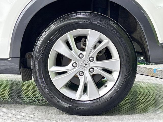 ヴェゼル ハイブリッドX・ホンダセンシング 本州仕入 4WD 純正SDナビ バックカメラ 寒冷地仕様 ホンダセンシング レーダークルーズ LEDヘッド オートライト シートヒーター デュアルオートエアコン ETC 車線逸脱警報 電動格納ミラー(71枚目)