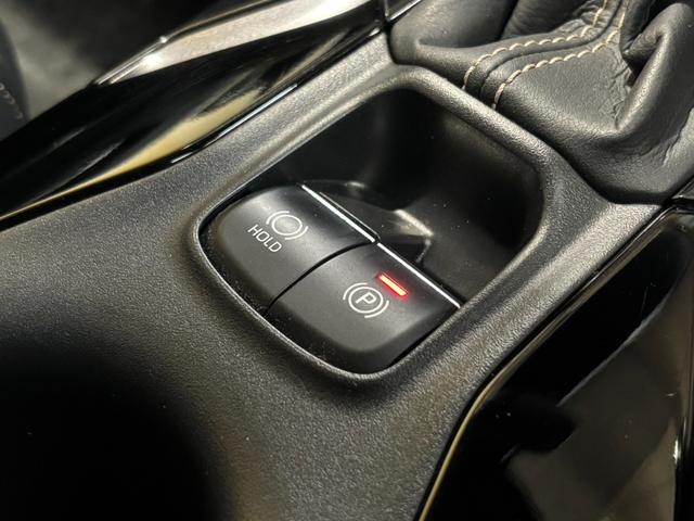 カローラツーリング ハイブリッド　ダブルバイビー　４ＷＤ／９型純正ナビ／Ｂカメラ／ＴＶ／セーフティセンス／ドラレコ前後／スペアキー／ＬＥＤヘッドライト／ＬＥＤフォグライト／ＬＥＤデイライト／シートヒーター／ハンドルヒーター／ＡＣ１００Ｖ電源／ソナー（28枚目）