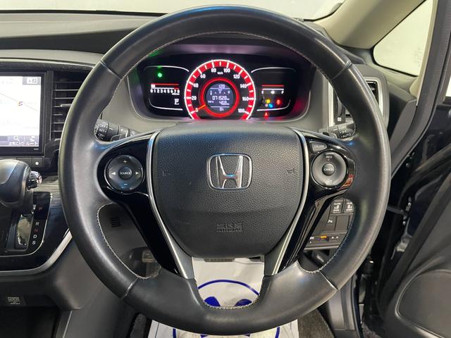 オデッセイ アブソルート・Ｘホンダセンシング　４ＷＤ／夏冬タイヤ付／９型ナビ／フリップダウン／Ｂカメラ／ＴＶ／寒冷地仕様／両側パワースライドドア／ＬＥＤヘッドライト／衝突軽減／スペアキー／ＥＴＣ／パワーシート／ＣＤ＋ＤＶＤ再生／Ｂｌｕｅｔｏｏｔｈ（14枚目）