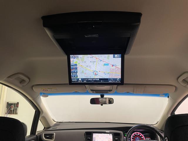 オデッセイ アブソルート・Ｘホンダセンシング　４ＷＤ／夏冬タイヤ付／９型ナビ／フリップダウン／Ｂカメラ／ＴＶ／寒冷地仕様／両側パワースライドドア／ＬＥＤヘッドライト／衝突軽減／スペアキー／ＥＴＣ／パワーシート／ＣＤ＋ＤＶＤ再生／Ｂｌｕｅｔｏｏｔｈ（19枚目）