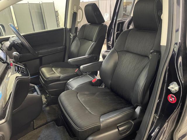 オデッセイ アブソルート・Ｘホンダセンシング　４ＷＤ／夏冬タイヤ付／９型ナビ／フリップダウン／Ｂカメラ／ＴＶ／寒冷地仕様／両側パワースライドドア／ＬＥＤヘッドライト／衝突軽減／スペアキー／ＥＴＣ／パワーシート／ＣＤ＋ＤＶＤ再生／Ｂｌｕｅｔｏｏｔｈ（33枚目）