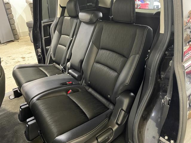 オデッセイ アブソルート・Ｘホンダセンシング　４ＷＤ／夏冬タイヤ付／９型ナビ／フリップダウン／Ｂカメラ／ＴＶ／寒冷地仕様／両側パワースライドドア／ＬＥＤヘッドライト／衝突軽減／スペアキー／ＥＴＣ／パワーシート／ＣＤ＋ＤＶＤ再生／Ｂｌｕｅｔｏｏｔｈ（34枚目）