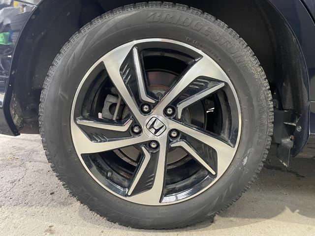 オデッセイ アブソルート・Ｘホンダセンシング　４ＷＤ／夏冬タイヤ付／９型ナビ／フリップダウン／Ｂカメラ／ＴＶ／寒冷地仕様／両側パワースライドドア／ＬＥＤヘッドライト／衝突軽減／スペアキー／ＥＴＣ／パワーシート／ＣＤ＋ＤＶＤ再生／Ｂｌｕｅｔｏｏｔｈ（44枚目）