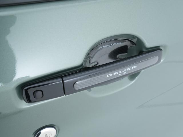 デリカミニ Ｔ　プレミアム　アップサス　バンパーガード（ＤＡＮＳＨＡＱ）　オープンカントリー　ナイトロパワーＭ２９スティンガーホイール　社外ステンレスマフラー　マッドフラップ　ナビ　マルチアラウンドモニター　エンジンスターター（9枚目）