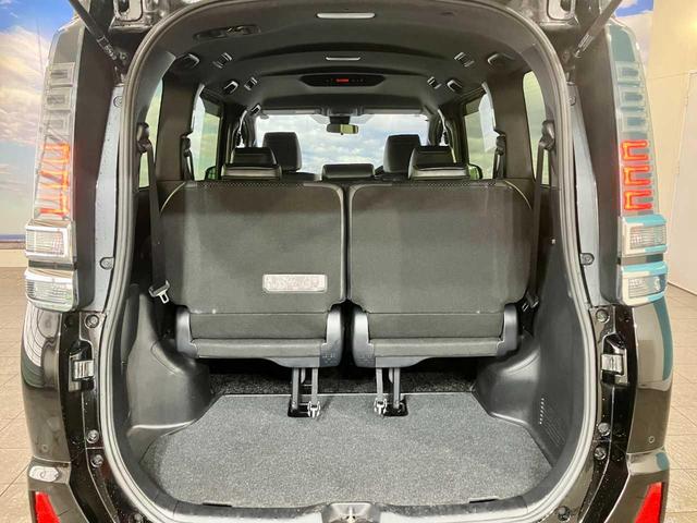 ヴォクシー ＺＳ　煌ＩＩＩ　Ｂｌｕｅｔｏｏｔｈ接続　ＥＴＣ　両側電動スライドドア　４ＷＤ　寒冷地仕様車　衝突被害軽減　地デジＴＶ　バックモニター　ウォークスルー　３列シート　スペアキー　クリアランスソナー　メモリーナビ（65枚目）
