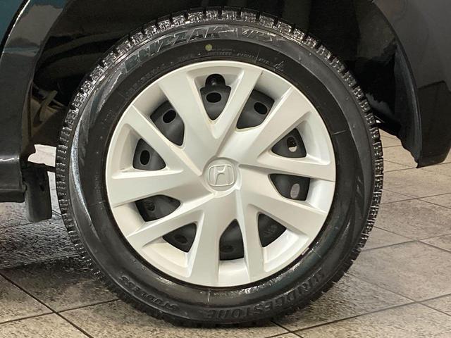 N-BOX G・Lホンダセンシング 夏冬タイヤ付き 純正エンジンスターター 寒冷地仕様 前席シートヒーター USBポート メモリナビ DVD バックモニター フルタイム4WD オートライト オートエアコン LEDヘッドライト(7枚目)
