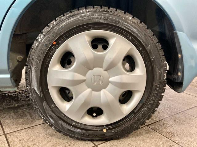 フィット 1.3A 寒冷地仕様 夏冬タイヤ付き 4WD キーレスエントリー 電動格納ミラー チップアップシート ABS パワステ パワーウィンドウ(6枚目)