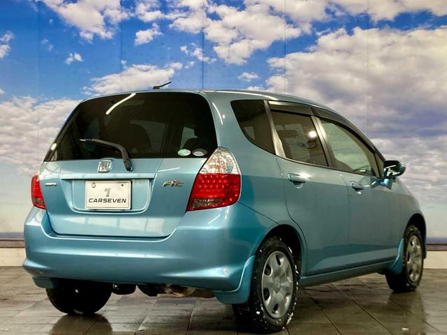 フィット 1.3A 寒冷地仕様 夏冬タイヤ付き 4WD キーレスエントリー 電動格納ミラー チップアップシート ABS パワステ パワーウィンドウ(12枚目)