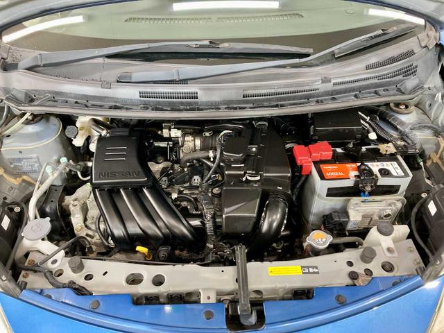 ノート Ｘ　ＦＯＵＲ　夏冬タイヤ付き　エンジンスターター　禁煙　ＥＴＣ　衝突安全ボディ　ワンセグＴＶ　パワーステアリング　ＡＵＸ端子　メモリーナビ付き　切替４ＷＤ　ＤＶＤ再生可（5枚目）