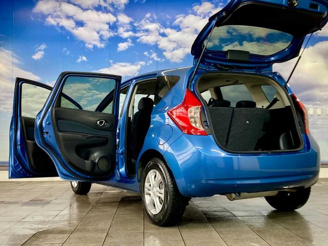 ノート Ｘ　ＦＯＵＲ　夏冬タイヤ付き　エンジンスターター　禁煙　ＥＴＣ　衝突安全ボディ　ワンセグＴＶ　パワーステアリング　ＡＵＸ端子　メモリーナビ付き　切替４ＷＤ　ＤＶＤ再生可（64枚目）