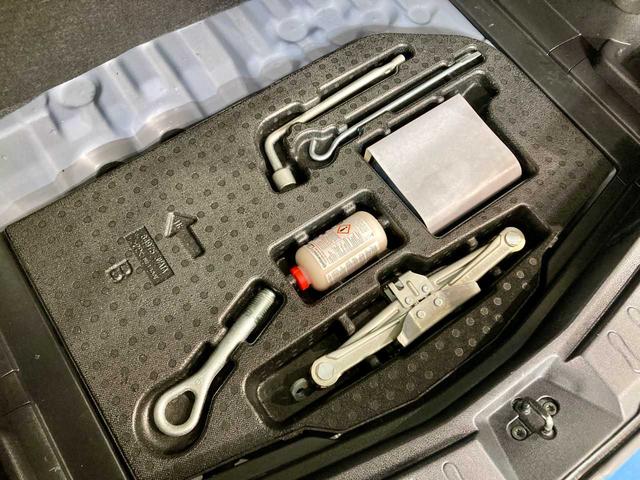 ノート Ｘ　ＦＯＵＲ　夏冬タイヤ付き　エンジンスターター　禁煙　ＥＴＣ　衝突安全ボディ　ワンセグＴＶ　パワーステアリング　ＡＵＸ端子　メモリーナビ付き　切替４ＷＤ　ＤＶＤ再生可（68枚目）