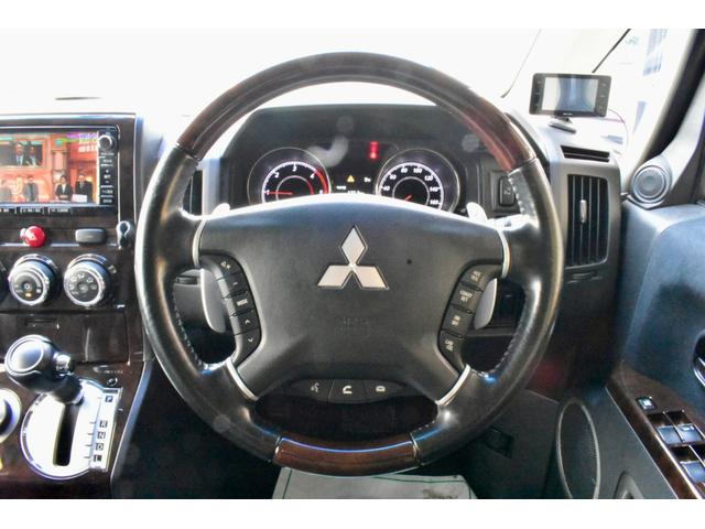 デリカＤ：５ シャモニー　４ＷＤ　本州仕入　１オーナー　ジオランダーＭ／Ｔ　新品フロントガード　両側電動スライドドア　シートヒーター　シートカバー付き（30枚目）