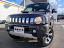 ジムニー クロスアドベンチャーXC ワンオーナー 雹害車 パートタイム4WD 社外メモリーナビ ワンセグTV 走行中OK シートヒーター 革巻きステア クロスアドベンチャー専用シート ハロゲンヘッドライト ハロゲンフォグ キーレス 中古車画像_3
