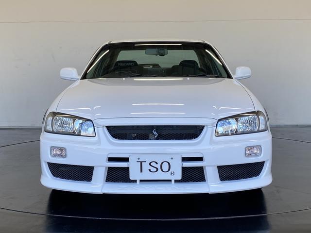 スカイライン 25GT-V 純正MT R34純正アルミボンネット アルティアFバンパー・Sスカート イーストベアーRバンパー・フェンダーモール バッドムーンレーシングマフラー TEIN車高調 WORKホイール フジツボエキマニ(3枚目)
