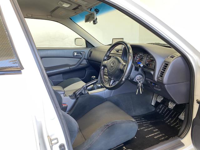 スカイライン 25GT-V 純正MT R34純正アルミボンネット アルティアFバンパー・Sスカート イーストベアーRバンパー・フェンダーモール バッドムーンレーシングマフラー TEIN車高調 WORKホイール フジツボエキマニ(5枚目)