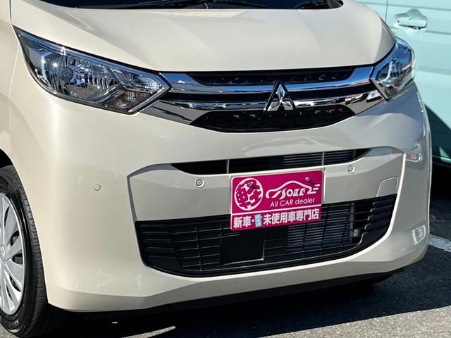 ｅＫワゴン Ｍ　バックカメラ／純正ＣＤオーディオ／オートライト／キーレス／衝突被害軽減ブレーキ／前後コーナーセンサー／ステアリングリモコン／アイドリングストップ／電動格納ミラー／シートリフター／ハロゲンヘッドライト（41枚目）